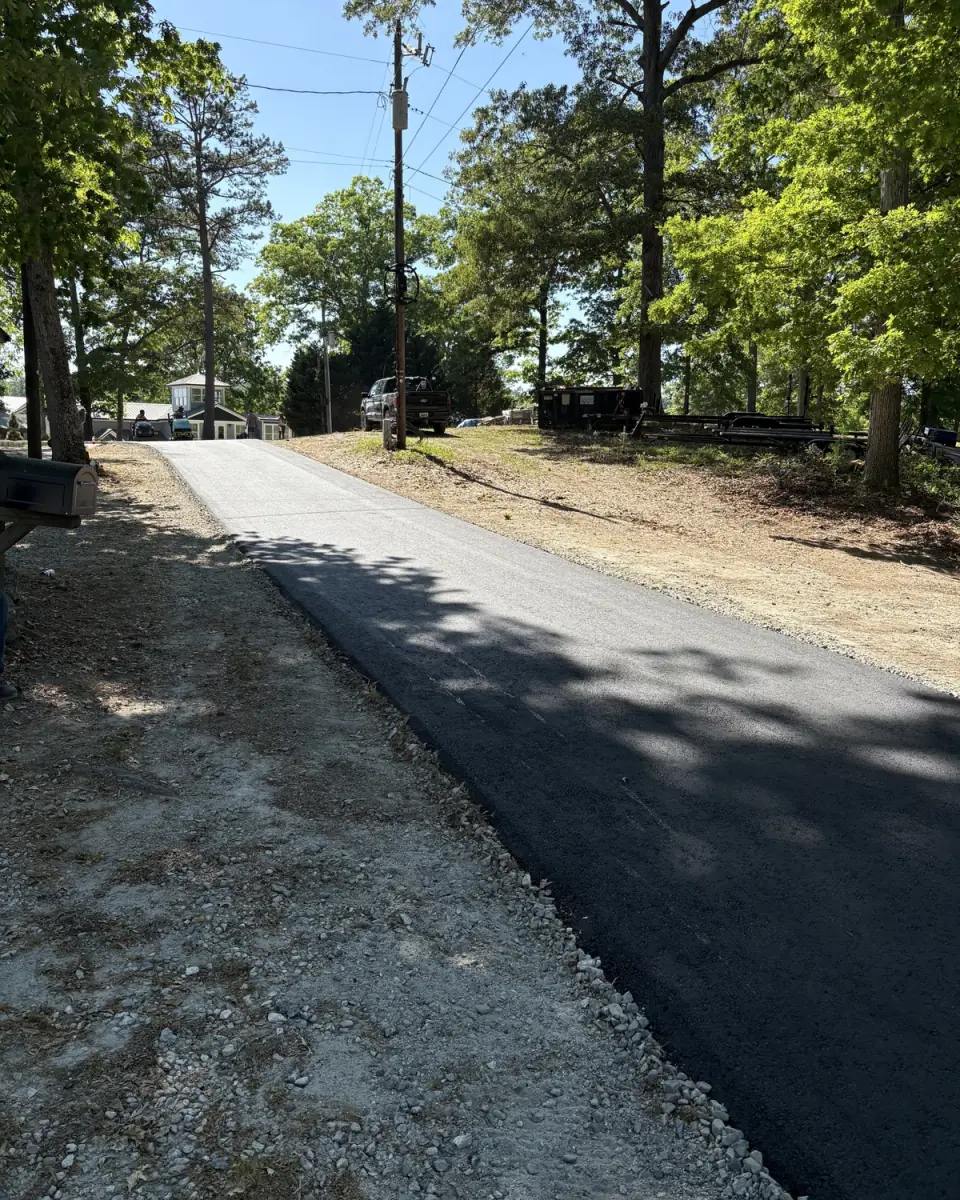 Long, freshly paved residential driveway in Jasper County, GA